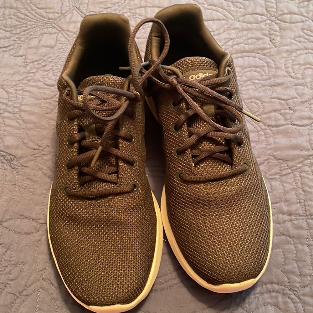 Black Adidas Prime green shoes. Size 10.  Great condition, worn a few times.